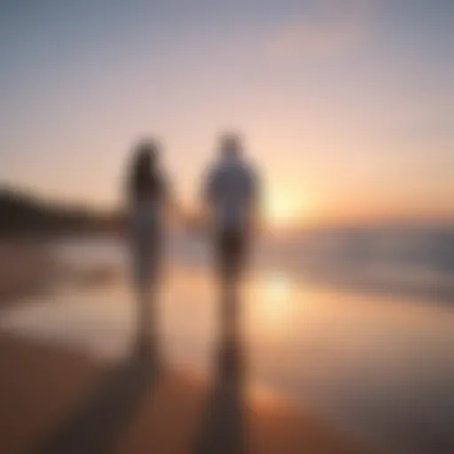 A couple walking hand in hand on a serene beach at sunset