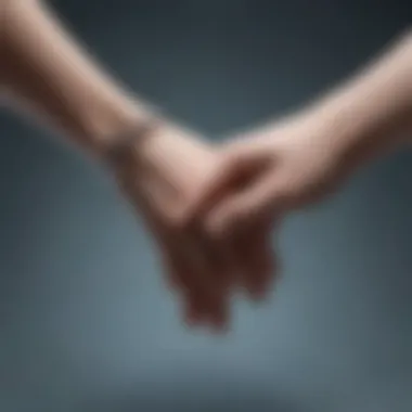 A close-up of intertwined fingers symbolizing connection