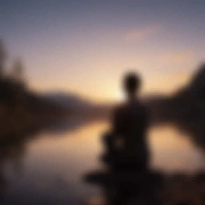 Silhouette of a person meditating at sunset