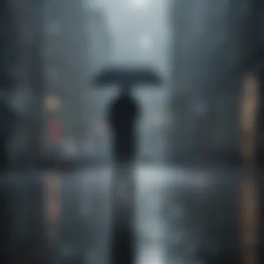 Lone figure standing in the rain with umbrella