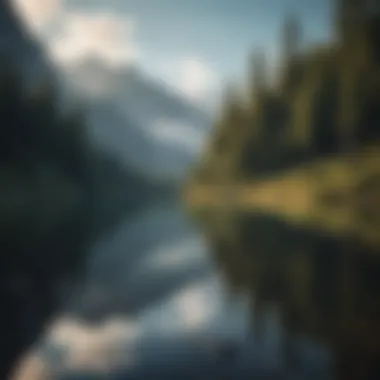 Majestic mountain landscape with a serene lake reflecting the sky and surrounding peaks