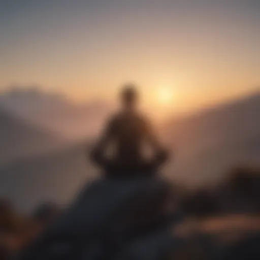 Silhouette of a person meditating on a mountain top at sunrise