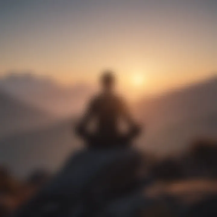 Silhouette of a person meditating on a mountain top at sunrise