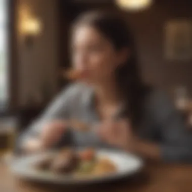 An individual enjoying a meal in a thoughtful manner