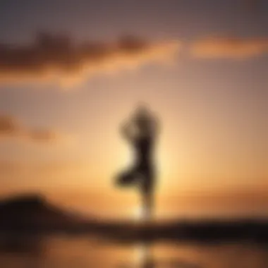 Silhouette of a person doing yoga at sunrise