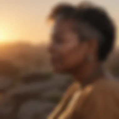 Silhouette of Maya Angelou against a sunset