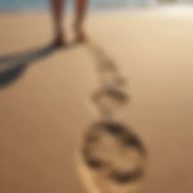 Footprints on a sandy beach symbolizing mindful walking