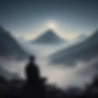 Silhouette of person meditating on a misty mountain