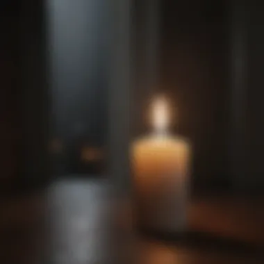 A candle burning in a dark room