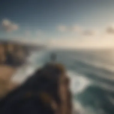 A person standing on a cliff overlooking the vast ocean