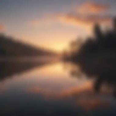 A serene sunrise over a calm lake reflecting tranquility and peace.