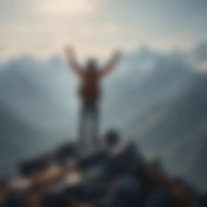 Person standing on mountain peak with arms raised in victory