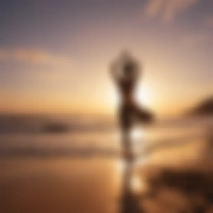 Woman practicing yoga on a beach at sunset