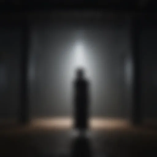 Silhouette of a lone figure surrounded by darkness